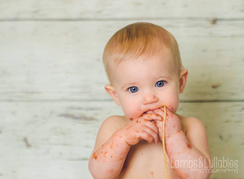 baby eating spaghetti