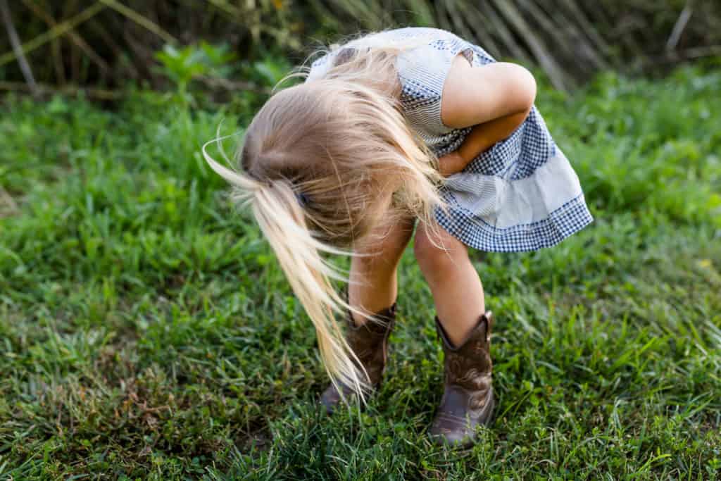 Child hurt her knees in a field in kansas