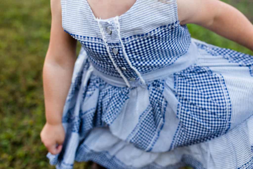 Little girl in blue dress in Kansas city area
