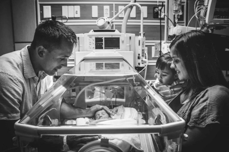 kansas city newborn photographer NICU baby picture with family