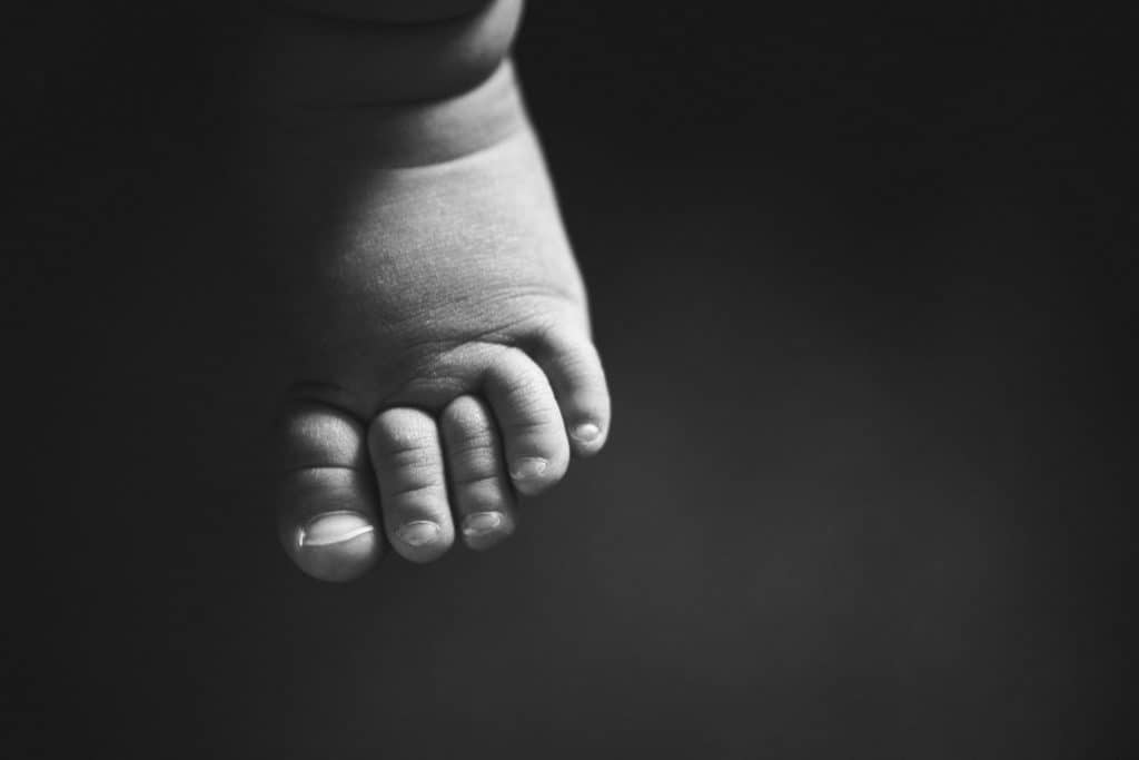 Detailed baby foot in black and white